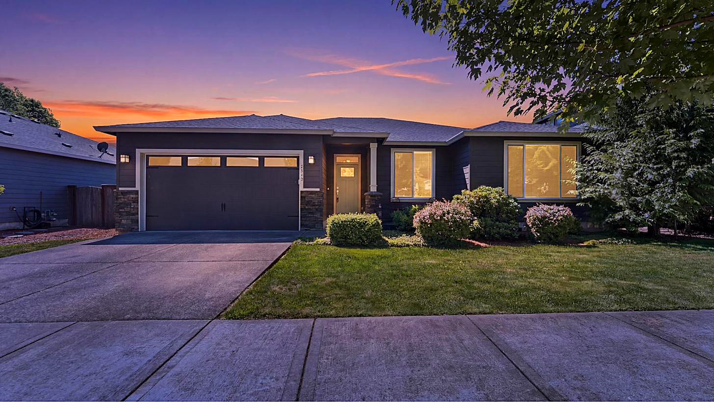 Twilight exterior of 7510 NE 176th Avenue, a single-level ranch home in Vancouver, Washington